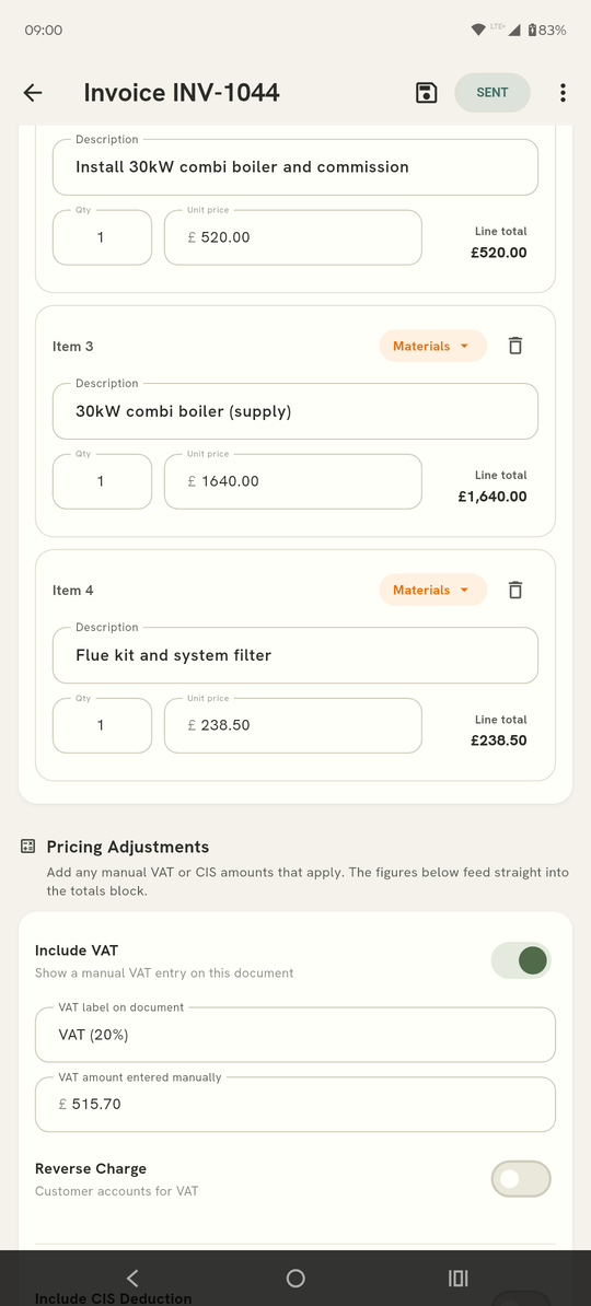 The invoice editor showing line items with labour and materials chips, per-line totals, and manual VAT entry